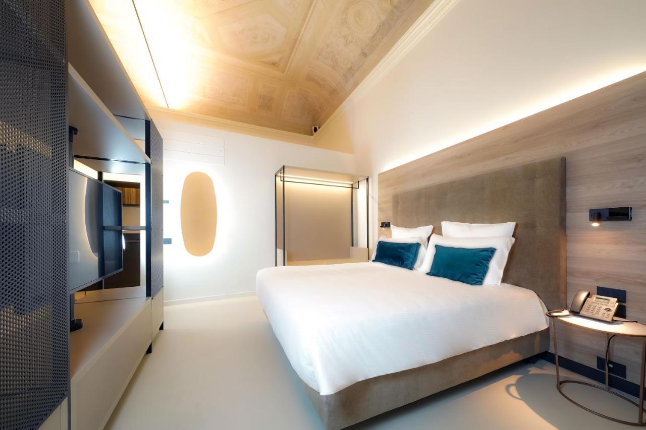 แบร์กาโม อินน์ 21 ภายนอก รูปภาพ A bedroom at the hotel